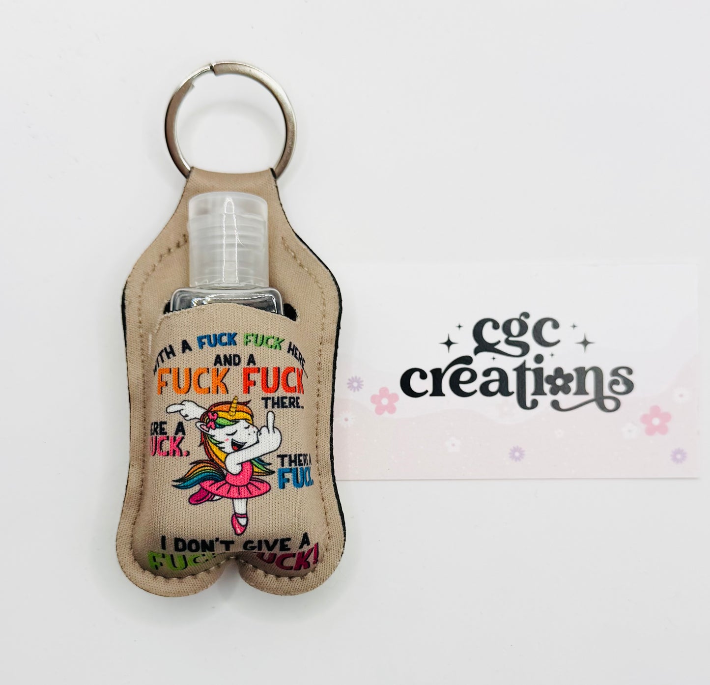 With a Fuck Fuck Here Neoprene Sanitizer Keychain